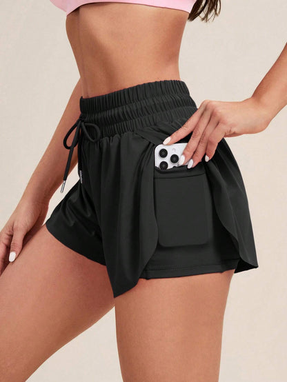 Lockere Sport-Shorts mit Taschen und Bindeband