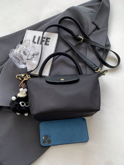 Im Winter, die neue Mini-Handtasche mit Kontrastfarbdesign, nylon-wasserfestem Gewebe Umhängetasche, quadratische Tasche und Gemüsekorbtasche, geeignet für den Weg zur Arbeit, Partys und UrlaubsDating. Größe: Länge: 19cm * Breite: 6cm * Höhe: 10cm